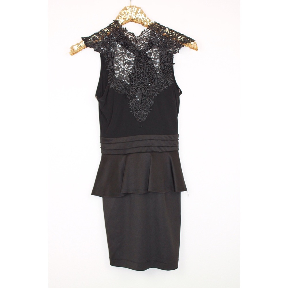 🔴 The vintage shop black dress